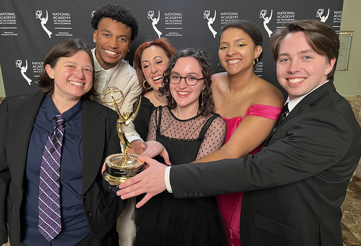 From left, Middle Tennessee State University representatives Allie Sultan, Media Arts associate professor; recording industry major Nick Edgerson; Recording Industry assistant professor Bess Rogers; commercial songwriting major Kelty Greye; Recording industry major Liliana Manyara; Audio Production major Phillip Beima are all smiles as they hold the regional Emmy Award the university received for its "We Do It All" commercial Saturday, Feb. 17, at the 38th annual Nashville/MidSouth Emmy Awards ceremony at Nashville’s Schermerhorn Symphony Center. (MTSU photo by Andrew Oppmann)