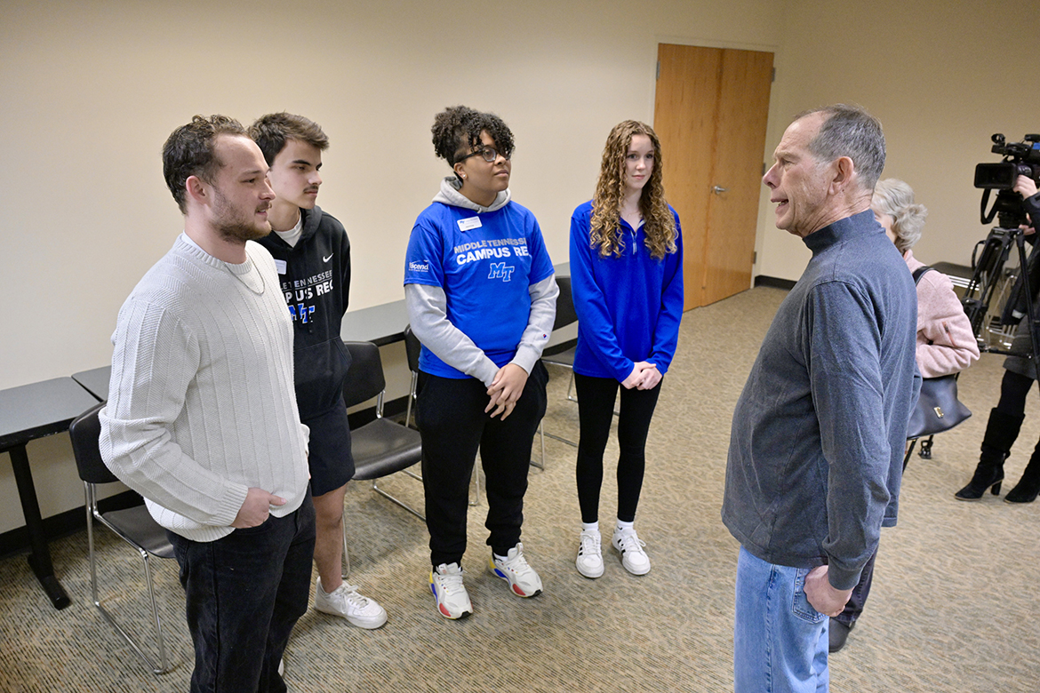 Retired Middle Tennessee State University professor and Computer Science Department Chair Richard Detmer, right, visits with, from left, Gatlin Murr, Andrew Scrugham, Jasmine Jackson and Julia Rutledge — four Recreation Center student workers who helped save his life when he experienced cardiac arrest while playing racquetball Jan. 19. Now recovered, Detmer, 78, and his wife, Carol, brought cookies Friday, Feb. 9, to thank the students and MTSU Campus Police for their life-saving responses. The students had received American Red Cross training to use CPR and AED equipment. (MTSU photo by Andy Heidt)