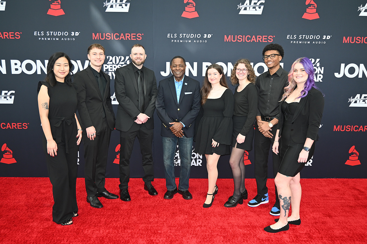 Middle Tennessee State University President Sidney A. McPhee, center, is joined by several students from the MTSU College of Media and Entertainment on the red carpet Friday, Feb. 2, in Los Angeles as the students worked the Recording Academy’s pre-Grammys black-tie charitable fundraising event honoring legendary rocker Jon Bon Jovi as MusiCares’ Person of the Year. For the ninth year, the university sent a delegation of students, faculty and administrators to Grammys to honor alumni nominees and network with industry professionals. (MTSU photo by Andrew Oppmann)