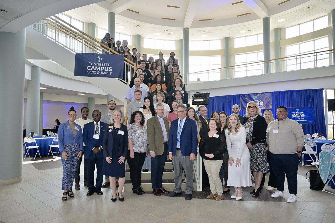 Students, faculty and administrators from 10 public and private state universities come together for a group photo with special guests during the Tennessee Campus Civic Summit, held Friday, Feb. 23, in the Middle Tennessee State University Miller Education Center’s second-floor atrium. The conference was held for students doing civic engagement work on their campuses and in their communities. (MTSU photo by Andy Heidt)