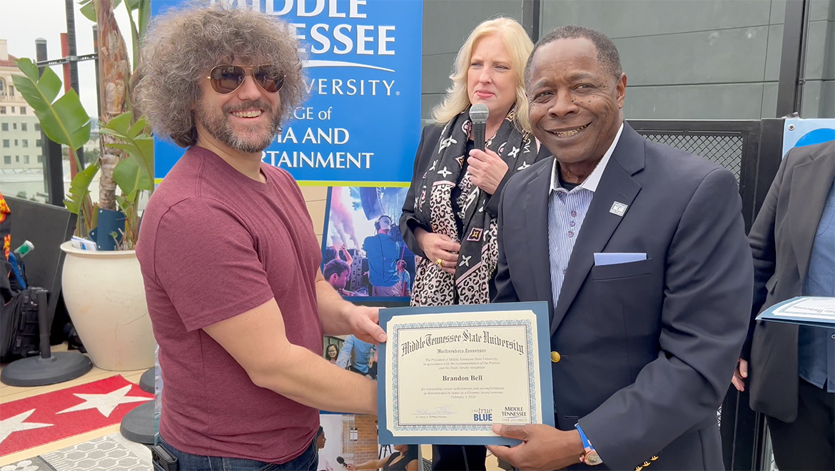 Brandon Bell, left, was among the MTSU alums nominated for a Grammy Award in 2024. He and the other nominees celebrated at a brunch ahead of the awards show. Also pictured, at right, is MTSU President Sidney A. McPhee and College of Media and Entertainment Dean Beverly Keel, back center. (MTSU photo by Andrew Oppmann)