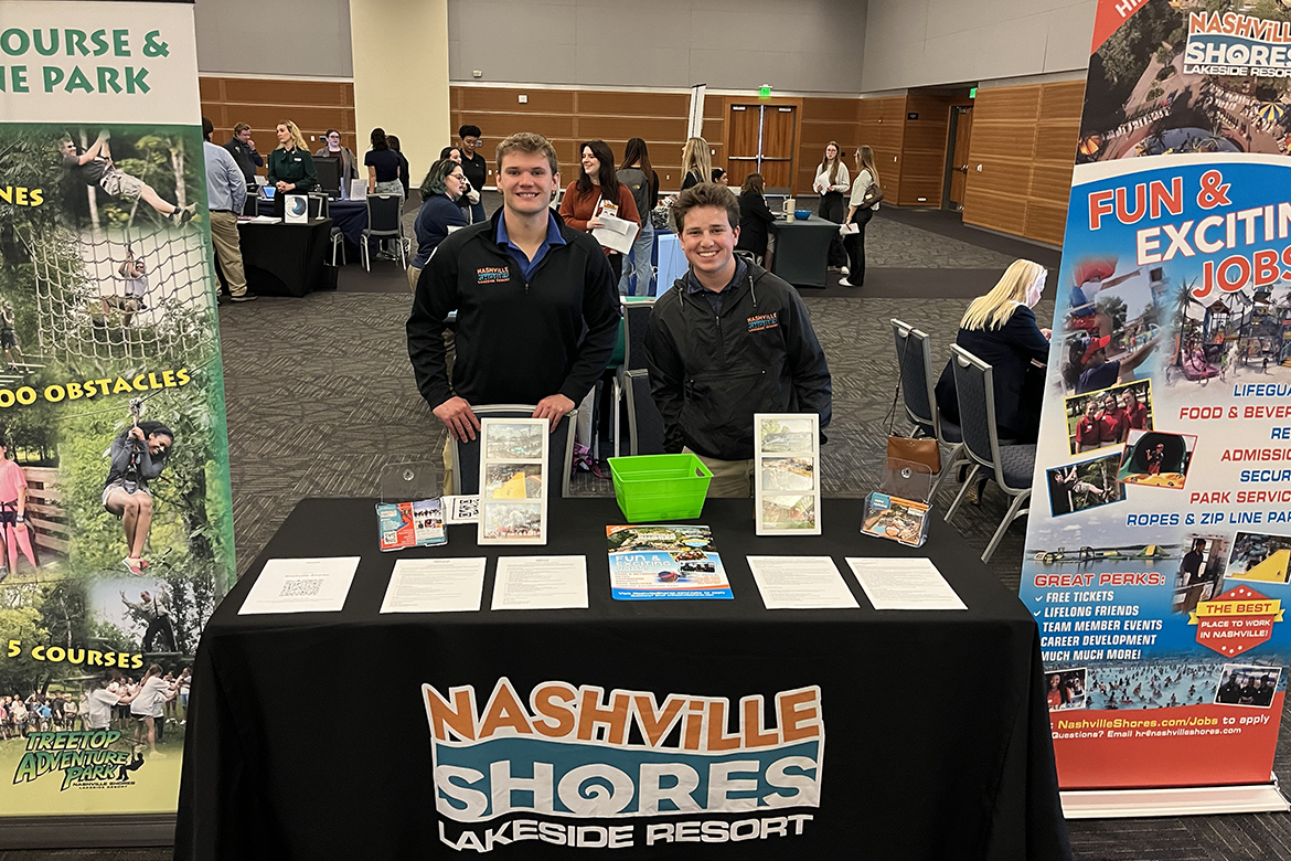 Middle Tennessee State University Tourism and Hospitality Management major Campbell Bledsoe of Nashville, Tenn., right, showed up to program’s Spring Career Fair as a representative of Nashville Shores water park and resort alongside Clay Swindle, a longtime aquatics employee. The Feb. 26 event was held in the Student Union Ballroom at MTSU in Murfreesboro, Tenn. (Submitted photo)