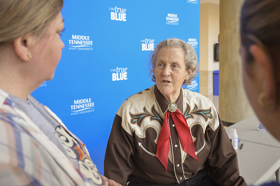 Autism advocate and animal welfare pioneer Temple Grandin, an animal science professor at Colorado State University, chats with attendees at a March 13 meet and greet inside the Science Building at Middle Tennessee State University in Murfreesboro, Tenn. Grandin was on campus for a screening of the documentary about her titled “An Open Door” held later in the evening at Tucker Theatre. (MTSU photo by Cat Curtis Murphy)