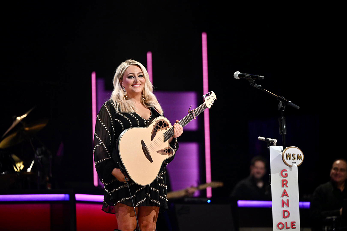 Middle Tennessee State University alumna Hunter Wolkonowski, more commonly known as HunterGirl, performs a song during her debut at the Grand Ole Opry on Saturday, March 2, 2024, in Nashville, Tenn. The Winchester, Tenn., native and rising country music singer/songwriter came in second place on “American Idol” in 2022 and is an honorary professor in MTSU’s College of Media and Entertainment. (MTSU photo by James Cessna)
