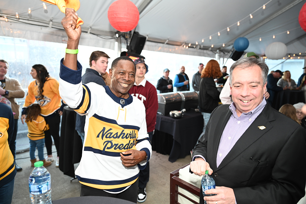 Middle Tennessee State University President Sidney A. McPhee, left, and Nashville Predators’ CEO Sean Henry enjoy pregame festivities at the March 2023 Preds True Blue Night/Military Appreciation game at Bridgestone Arena in Nashville, Tenn. MTSU makes a return visit Tuesday, March 19, when the NHL Predators host the San Jose Sharks. (MTSU file photo by James Cessna)