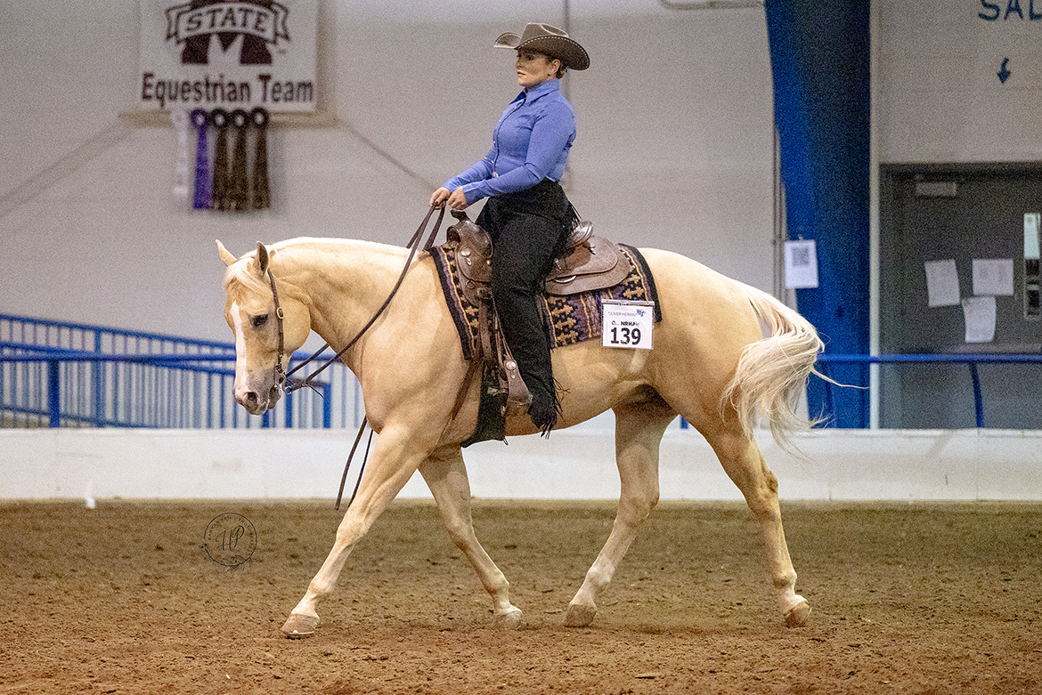 Riding a horse named Oliver Herrin, Middle Tennessee State University student Mackenzie Latimer competes during the Intercollegiate Horse Shows Association Western Semi-Finals March 22-23 at the Tennessee Livestock Center in Murfreesboro, Tenn. The senior dietetics major from Millbrook, N.Y., was part of two Champion Teams and placed fourth in Individual Level I Horsemanship, qualifying for nationals in May in Tryon, N.C. (Submitted photo by Hanna Price Photography)