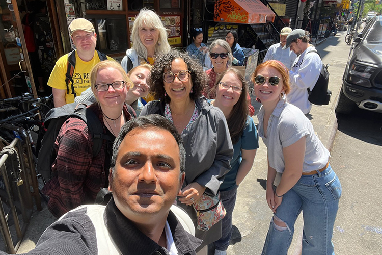 The New School part-time assistant professor Hanna Griff, center, gives a tour of the Jewish Lower East Side in New York City to Middle Tennessee State University graduate students and MTSU history professor Martha Norkunas, back row center left, during an experiential learning trip to New York during Maymester 2023. (Submitted photo)