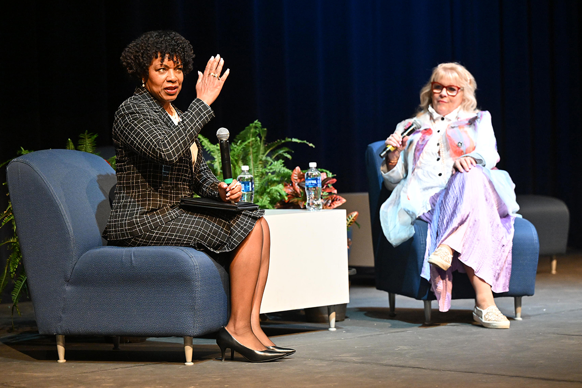 NASA engineer Shelia Nash Stevenson, left, shares insights about life achievements during the Middle Tennessee State University “Women of True Grit” Conference held Tuesday, March 12, inside Tucker Theatre on the MTSU campus in Murfreesboro, Tenn. At right is author Edie Hand, whose book of the same name inspired the conference. (MTSU photo by James Cessna)