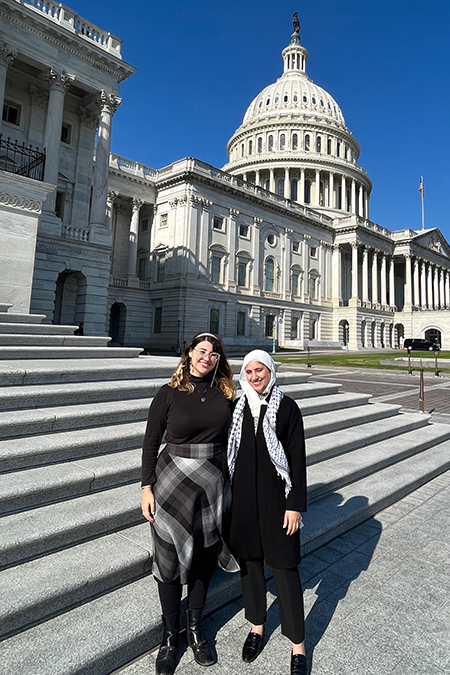With the U.S. Capitol in the background, Middle Tennessee State University undergraduate researchers Brooke Busbee, left, and Mina Abdulkareem pose for a photo during their travels to Washington in November 2023 for a conference as part of the larger, six-month Scholars Transforming Through Research: Council on Undergraduate Research’s Advocacy Program the young women have been participating in and will complete next month. (Submitted photo)