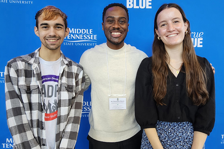 Rashawn Davis, center, executive director of the Andrew Goodman Foundation and keynote speaker at the Tennessee Campus Civic Summit at Middle Tennessee State University, takes a photo with MTSU students Marcus Rosario, left, and Hannah Ferreira, right, during a break in the summit held Feb. 23, 2024, in MTSU’s Miller Education Center in Murfreesboro, Tenn. The two students have been named inaugural Andrew Goodman Foundation ambassadors for the Blue Raider campus to support leadership development, voter accessibility and social justice initiatives. (MTSU photo by Robin E. Lee)