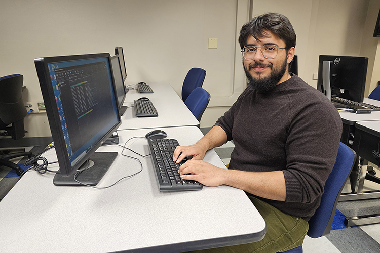 Middle Tennessee State University junior Carlos Aldana Lira of La Vergne, Tenn., is shown in a computer lab in the Kirksey Old Main building on the MTSU campus in Murfreesboro, Tenn. He was awarded a Research Experience for Undergraduates internship, or REU, known as DUB, which stands for “Design. Build. Use.” that will take place at the University of Washington in Seattle during the summer of 2024. (MTSU photo by Robin E. Lee)