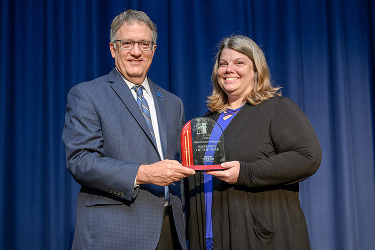 Middle Tennessee State University Provost Mark Byrnes presents the 2023-24 Administrative Professional Employee of the Year Award to Katie Morris-Fitch from the School of Journalism and Strategic Media at a reception held at James Union Building on campus in Murfreesboro, Tenn. She was one of four employees to receive an award. (MTSU photo by Andy Heidt)