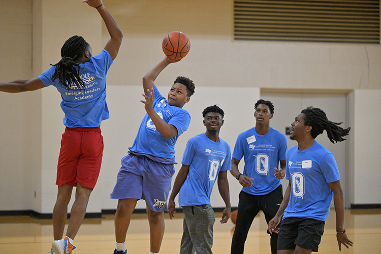 Middle Tennessee State University students and students from Oakland Middle School in Murfreesboro, Tenn., play each other in a pick-up game of basketball on April 12, 2024, at the Campus Rec Center as part of the Emerging Leaders Academy mentorship program put on by the College of Education’s Center for Fairness, Justice and Equity. (MTSU photo by Andy Heidt)