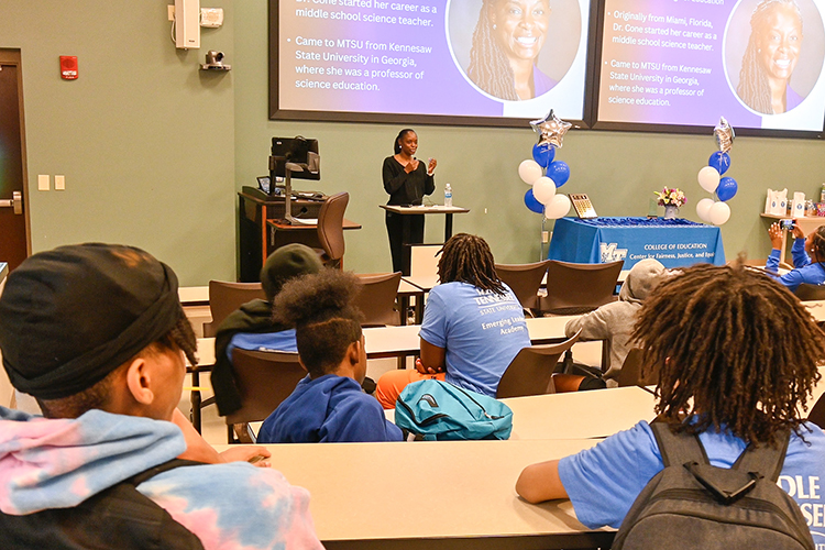 Neporcha Cone, front and center, College of Education dean at Middle Tennessee State Tennessee, speaks to MTSU students and Oakland Middle School students on April 12, 2024, at MTSU’s education building in Murfreesboro, Tenn., as part of the Emerging Leaders Academy mentorship program put on by the college’s Center for Fairness, Justice and Equity. (MTSU photo by Stephanie Wagner)