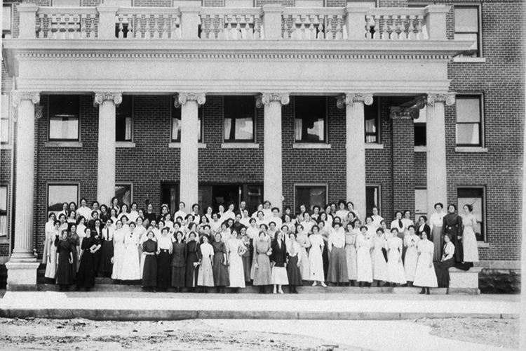 This circa September 1911 historic photo of a large group of students and instructors in front of Kirksey Old Main, the first of the five original buildings constructed on what was then Middle Tennessee State Normal School when founded in 1911 and is now Middle Tennessee State University. (MTSU file photo)