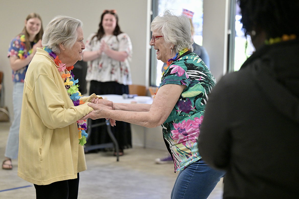 Members of St. Clair Street Senior Center in Murfreesboro, Tenn., dance as part of the “cruise” party hosted by Aging Health and Development students from the Department of Human Development and Family Science at Middle Tennessee State University in Murfreesboro. Each Friday during the semester, students taught by lecturer Samantha Weir plan and implement interactive games at St. Clair as well as Stones River Manor, also in Murfreesboro. (MTSU photo by J. Intintoli)