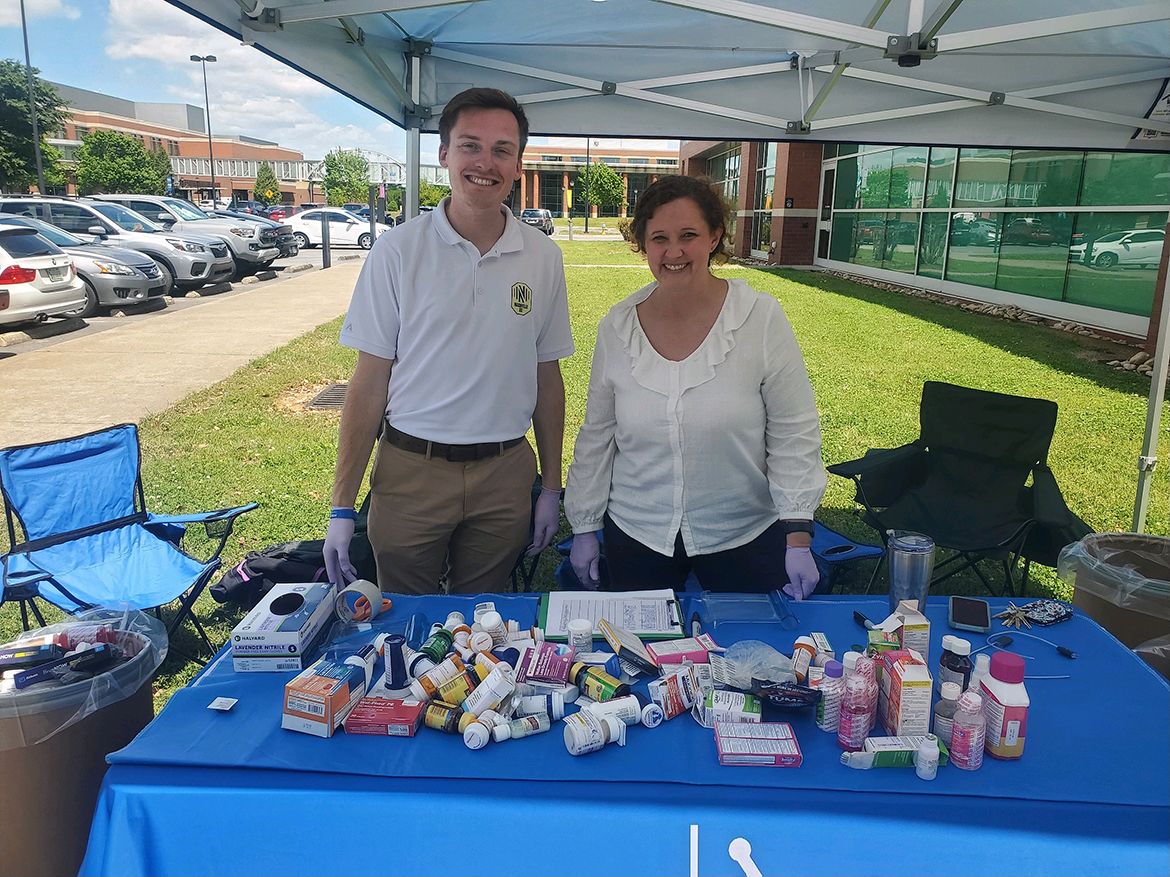 Chipper Smith, left, senior project coordinator in the Middle Tennessee State University Office of Prevention Science and Recovery, and MTSU Pharmacist Tabby Ragland are shown with a portion of nearly 77 pounds of medications collected Wednesday, April 24, during the spring Prescription Drug Take-Back Day held near the Campus Pharmacy drive-thru outside the Health, Wellness and Recreation Center on Blue Raider Drive in Murfreesboro, Tenn. The drive included collecting 60 vapes. (Submitted photo)