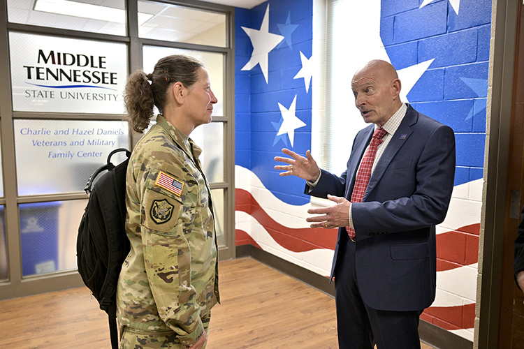 Lt. Gen. Jody Daniels, left, commanding general of the U.S. Army Reserve, chats with retired Army Lt. Gen. Keith Huber, senior adviser for veterans and leadership initiatives at Middle Tennessee State University, outside the Charlie and Hazel Daniels Veterans and Military Family Center during Daniels’ visit Tuesday, May 21, to the MTSU campus in Murfreesboro, Tenn. (MTSU photo by J. Intintoli)