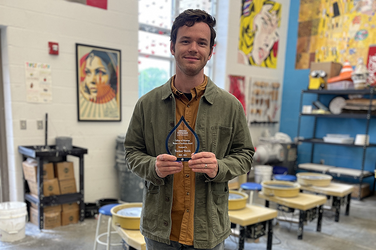 Middle Tennessee State University presented Tucker Webb, art teacher at Stewarts Creek High School in Smyrna, Tenn., with a Mentor Teacher of Excellence award for his work mentoring MTSU education students, in May 2024. (Submitted photo)
