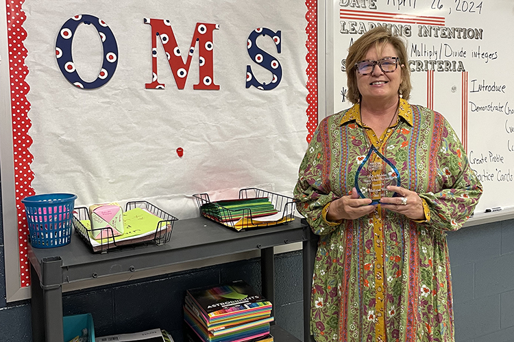 Middle Tennessee State University presented Melissa West, math teacher at Oakland Middle School in Murfreesboro, Tenn., with a Mentor Teacher of Excellence award for her work mentoring MTSU education students, in May 2024. (MTSU photo by Shannon Harmon)