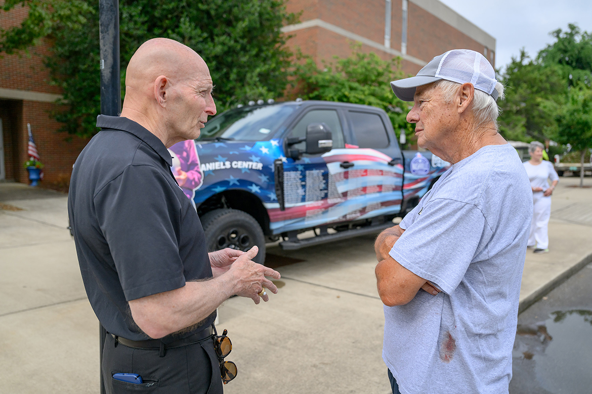 Keith M. Huber, left, Middle Tennessee State University senior adviser for veterans and military initiatives and a retired U.S. Army lieutenant general, chats with U.S. Army veteran and MTSU alumnus Charlie Strasser of Arrington, Tenn., who came to the campus in Murfreesboro, Tenn., Thursday, June 27, to view the special Nashville Super Speedway Veterans Tribute Truck on display outside the Keathley University Center, home of the Charlie and Hazel Daniels Veterans and Military Family Center. The truck will be on display Friday through Sunday, June 28, next to the Daniels Veterans Center tent that’s part of the Ally 400 race weekend events at the Gladeville track. (MTSU photo by J. Intintoli)