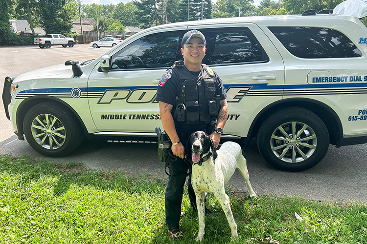 Middle Tennessee State University’s Police Department recently swore in its second K-9 Officer Ace, right, who will work and live with his handler Officer Joseph “Jad” Dishner. Ace is trained in explosives detection and will add an extra level of security to campus during athletic and other events. (MTSU photo by Jacob Wagner)