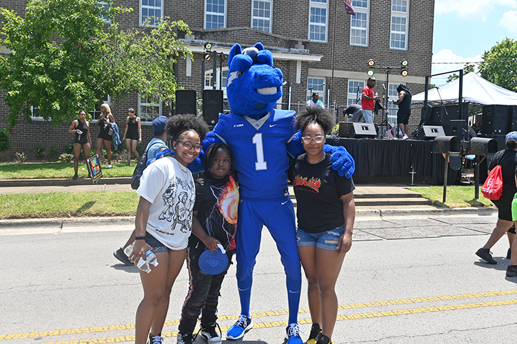 Middle Tennessee State University mascot Lightning takes a photo with his many fans at the 2024 Murfreesboro Juneteenth celebration and street festival held Saturday, June 15, in front of the Bradley Academy Museum and Cultural Center along South Academy Street in Murfreesboro, Tenn. (MTSU photo by Jimmy Hart)