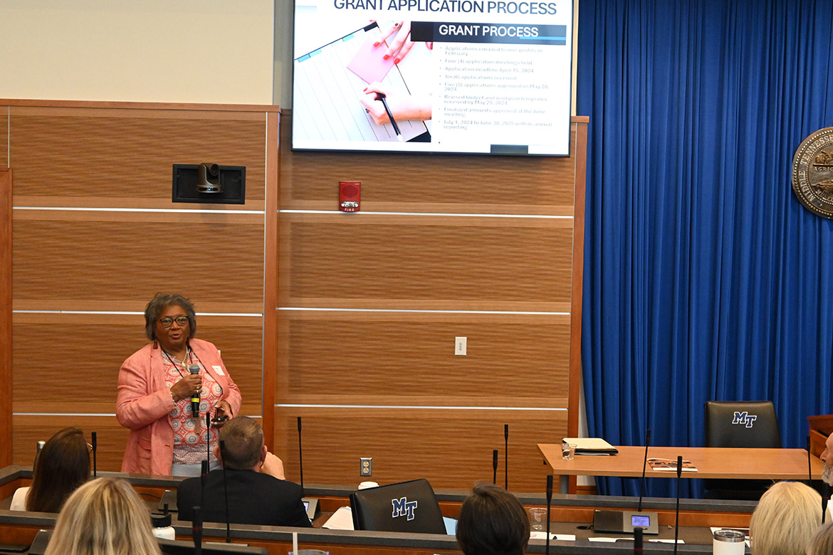 Fredia Lusk, executive director of the Community Clinic of Shelbyville and Bedford County, talks about how her team is utilizing opioid abatement grant funding to support families affected by addiction at the Middle Tennessee Opioid Abatement Summit held June 7 on the campus of Middle Tennessee State University in Murfreesboro, Tenn. The event brought together stakeholders registering from 20 counties and seven cities across the Midstate to discuss ideas for maximizing Tennessee’s opioid abatement settlement funds. (MTSU photo by Nancy DeGennaro)