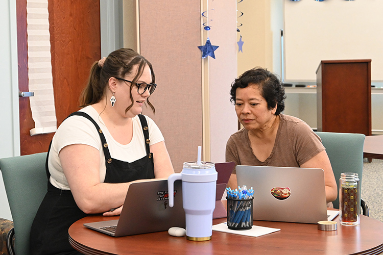 Pictured here, from left, are Ashley Quinn, a University Writing Center tutor and Ph.D. candidate in the English Department at Middle Tennessee State University, and Ida Leggett, a professor in sociology and anthropology, engaged in a writing session in the University Writing Center on the MTSU campus in Murfreesboro, Tenn. (MTSU photo by Johari Hamilton)