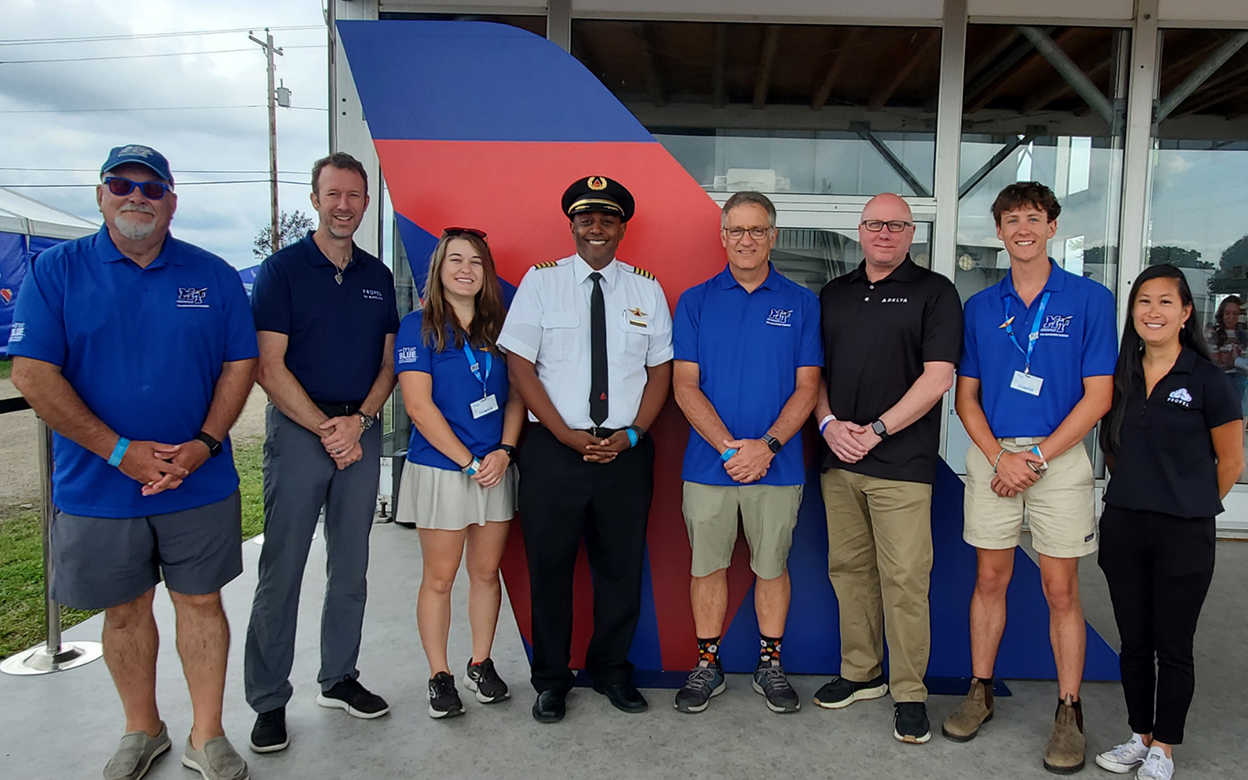 Middle Tennessee State University Provost Mark Byrnes and others from the university’s 2024 EAA AirVenture team meet with officials from Delta Airlines, representing Propel, the company’s pilot recruitment and training program, at the airshow in Oshkosh, Wis. (MTSU photo by Brian Delaney)