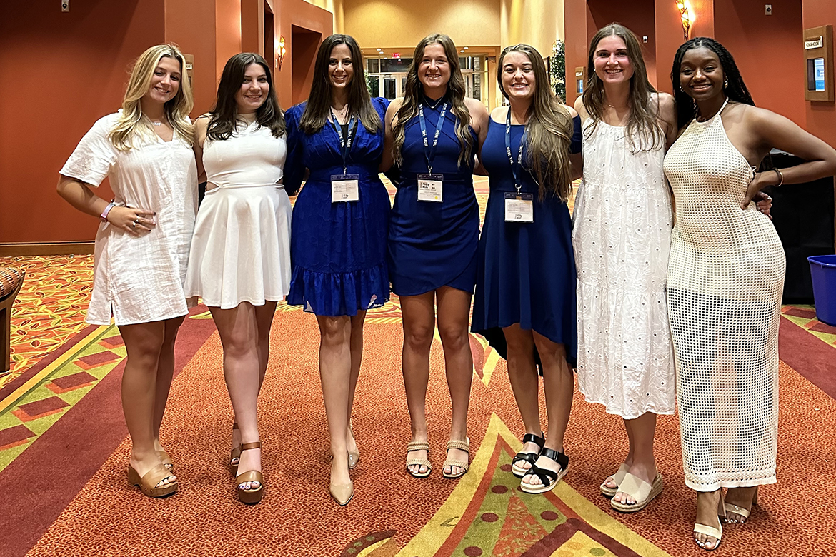 Middle Tennessee State University attendees, from left, Kennedy Hampton, Bri McDonald, Rachel Frankenberger, Hailey Harrison, Alyssa Smith, Meredith Boardman and Farilyn Hurt await the start of the annual Air Race Classic awards banquet in Loveland, Colo., on Sunday, June 23. Smith, Harrison and Frankenberger flew from Carbondale, Ill., to Loveland from June 18-21 competing in the event, where they placed 14th overall. (Submitted photo)