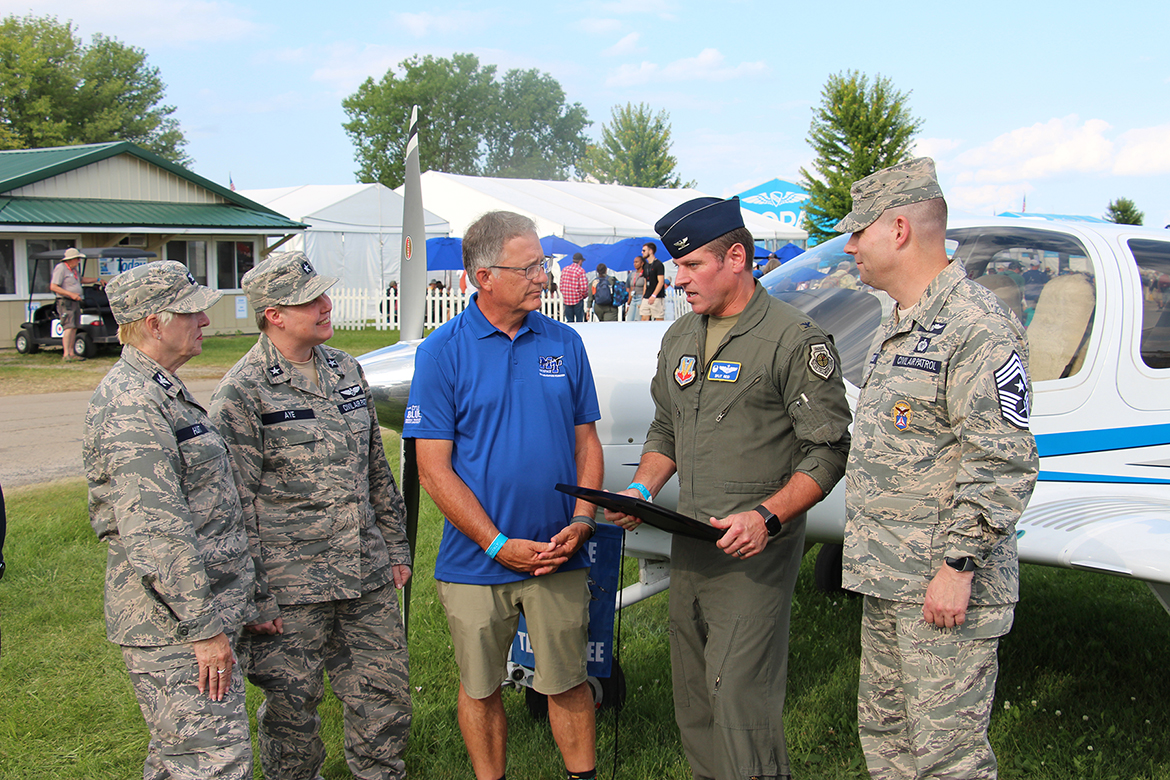 Middle Tennessee State University Provost Mark Byrnes, center left, chats with alumnus and Air Force Col. Aaron Reid, along with CAP National Vice Commander Brig. Gen. Regena Aye, second from left; CAP Great Lakes Region Commander Rose Hunt, far left; and CAP Command Chief Todd Parsons, far right. (MTSU photo by Brian Delaney)