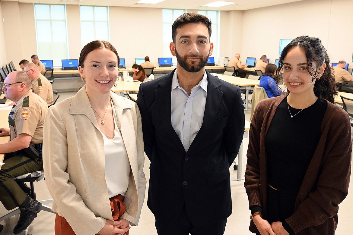 Industrial-Organizational Psychology students at Middle Tennessee State University, from left, McKenzie Adams, Raif Al Mezraani and Zeinab Mostafa worked on a project to design and administer testing on the MTSU campus in Murfreesboro, Tenn., for Tennessee Highway Patrol troopers and sergeants vying for promotions. The students are part of MTSU’s Center for Organizational and Human Resource Effectiveness, or COHRE, get real-world experience through this process. (MTSU photo by Nancy DeGennaro)