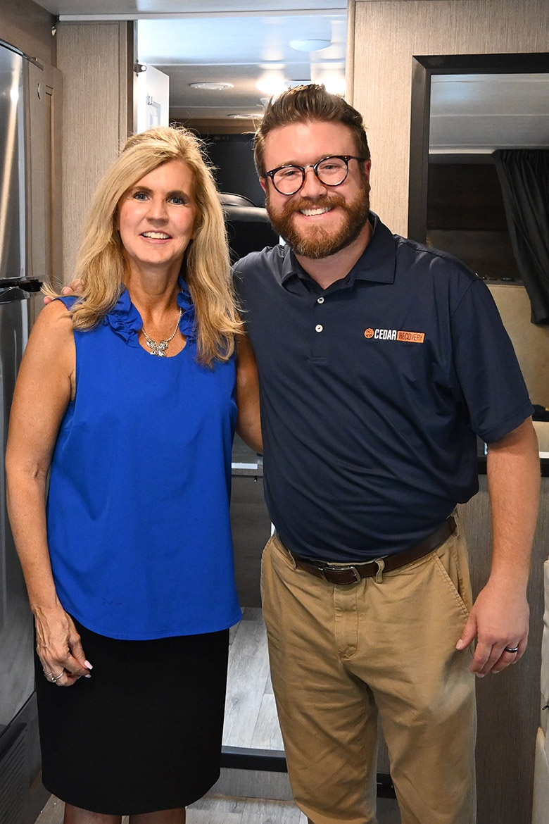 Cynthia Chafin, director of the Center for Health and Human Services at Middle Tennessee State University in Murfreesboro, Tenn., stands with Paul Trivette, chief strategy officer at Cedar Recovery addiction treatment company, inside the new grant-funded mobile clinic that will provide FDA-approved medication-assisted treatment for residents in rural areas of Middle Tennessee who are battling substance use disorders as well as mild to moderate mental health issues. (MTSU photo by Nancy DeGennaro)