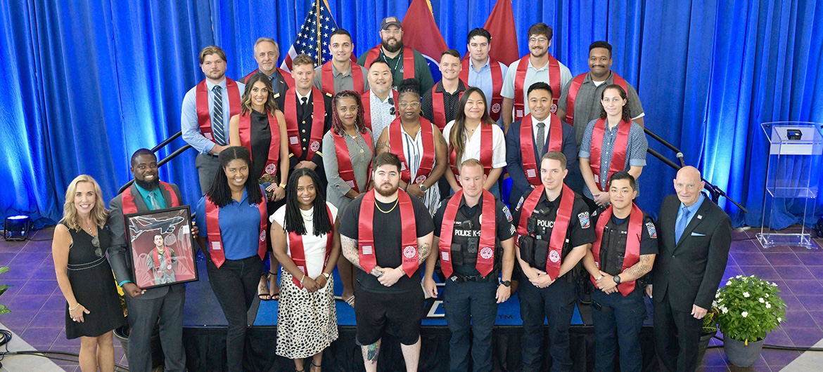 Middle Tennessee State University graduating senior veterans and faculty members including University Police Department officers are shown following the summer Graduating Veterans Stole Ceremony, held Friday, Aug. 9, at the Miller Education Center on Bell Street in Murfreesboro, Tenn. More than 30 veterans graduated Saturday, Aug. 10, in ceremonies at Murphy Center. (MTSU photo by Andy Heidt)