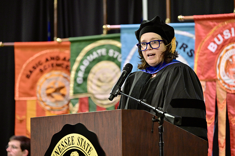 Middle Tennessee State University’s Kari Neely, associate professor in the Department of World Languages, Literatures, and Cultures and immediate past president of the Faculty Senate, gives keynote remarks to the 770-plus graduates at the university’s summer 2024 commencement ceremony held Saturday, Aug. 10, inside Murphy Center on the MTSU campus in Murfreesboro, Tenn. (MTSU photo by Andy Heidt)