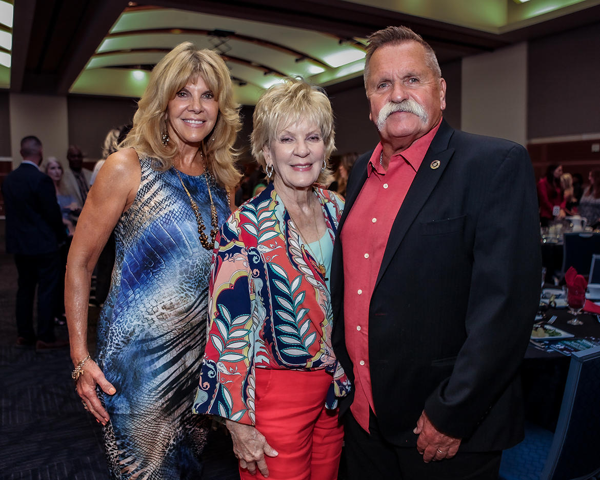 From left, Carolyn Corlew, Hazel Daniels, widow of the late country music legend Charlie Daniels, and David Corlew, Charlie Daniels’ longtime manager and partner with the nonprofit Journey Home Project, visit before the seventh annual Veteran Impact Celebration, hosted by the Middle Tennessee State University Daniels Veterans Center, held recently in the MTSU Student Union Ballroom in Murfreesboro, Tenn. (MTSU photo by Tom Beckwith)