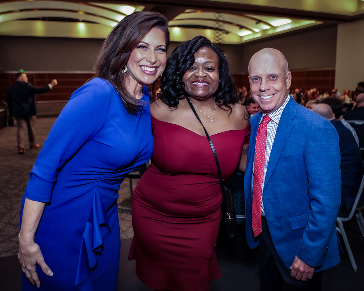 Middle Tennessee State University alumna and WSMV News4 morning anchor Holly Thompson, left, alumna Bobbie Johnson with Pinnacle Financial Partners, and Olympic gold medalist Scott Hamilton pose for a photo before the start of the seventh annual Veteran Impact Celebration recently in the Student Union Ballroom on the MTSU campus in Murfreesboro, Tenn. (MTSU photo by Tom Beckwith)