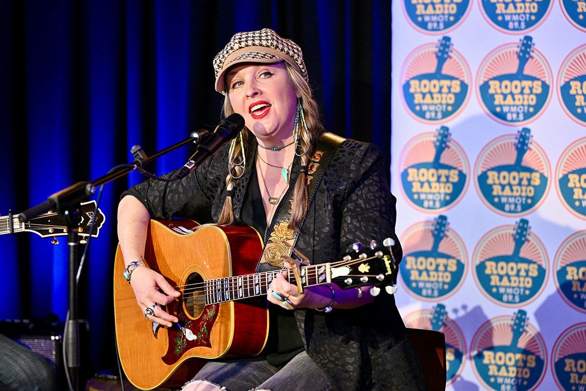 The private ribbon-cutting for WMOT Roots Radio 89.5's new satellite studio at Riverside Revival events in East Nashville, Tenn., on Aug. 7, 2024, included music and an in-studio interview with country artist Sunny Sweeney. (MTSU photo by James Cessna)