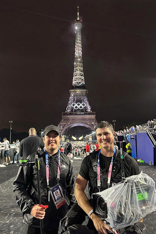 Tobin Smith, left, a senior video and film production major at Middle Tennessee State University in Murfreesboro, Tenn., poses with alumnus Tony Reyes in front of the Eiffel Tower in Paris, France, during the 2024 Summer Olympic Games this summer. The two were part of NBC Sports production team. (Photo submitted)