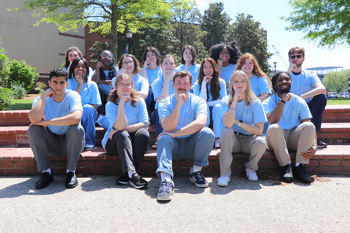 In this undated photo, the 17 founding members of the student-run Ever Blue Branding agency at Middle Tennessee State University in Murfreesboro, Tenn., pose on the steps outside of the John Bragg College of Media and Entertainment Building on campus. (Photo by Ever Blue Branding)