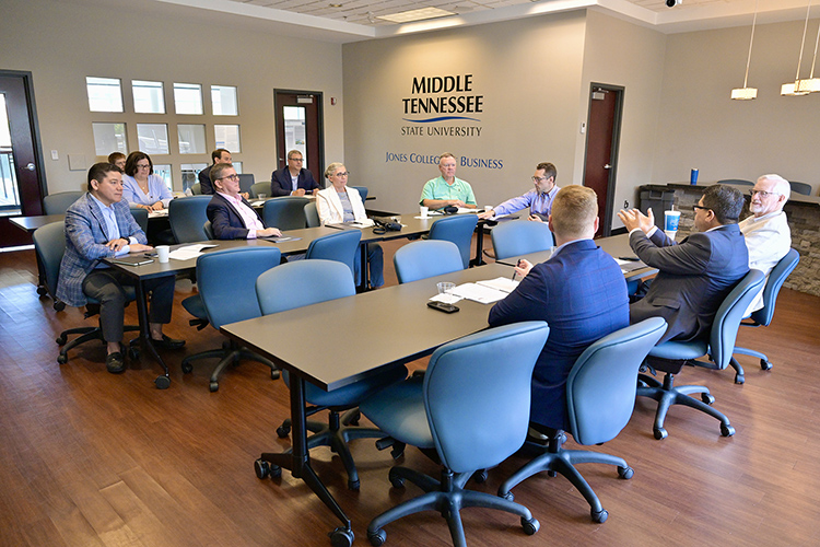 Murat Arik, second from right, holder of the Chair of Excellence in Regional and Urban Planning under the Jones College of Business at Middle Tennessee State University, meets recent with members of this year’s chair advisory committee inside the Business and Aerospace Building on the MTSU campus in Murfreesboro, Tenn. (MTSU photo by Andy Heidt)