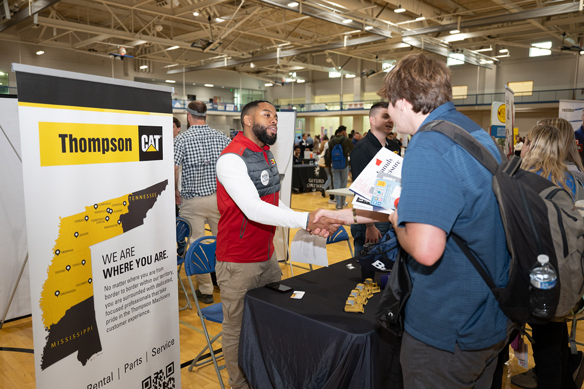 A Middle Tennessee State University student meets with Dominique Johnson, technician recruiter for Thompson Machinery, at the Career Development Center’s 2024 Big Career Fair held Thursday, Sept. 26, in the Campus Recreation Center in Murfreesboro, Tenn. (MTSU photo by James Cessna)