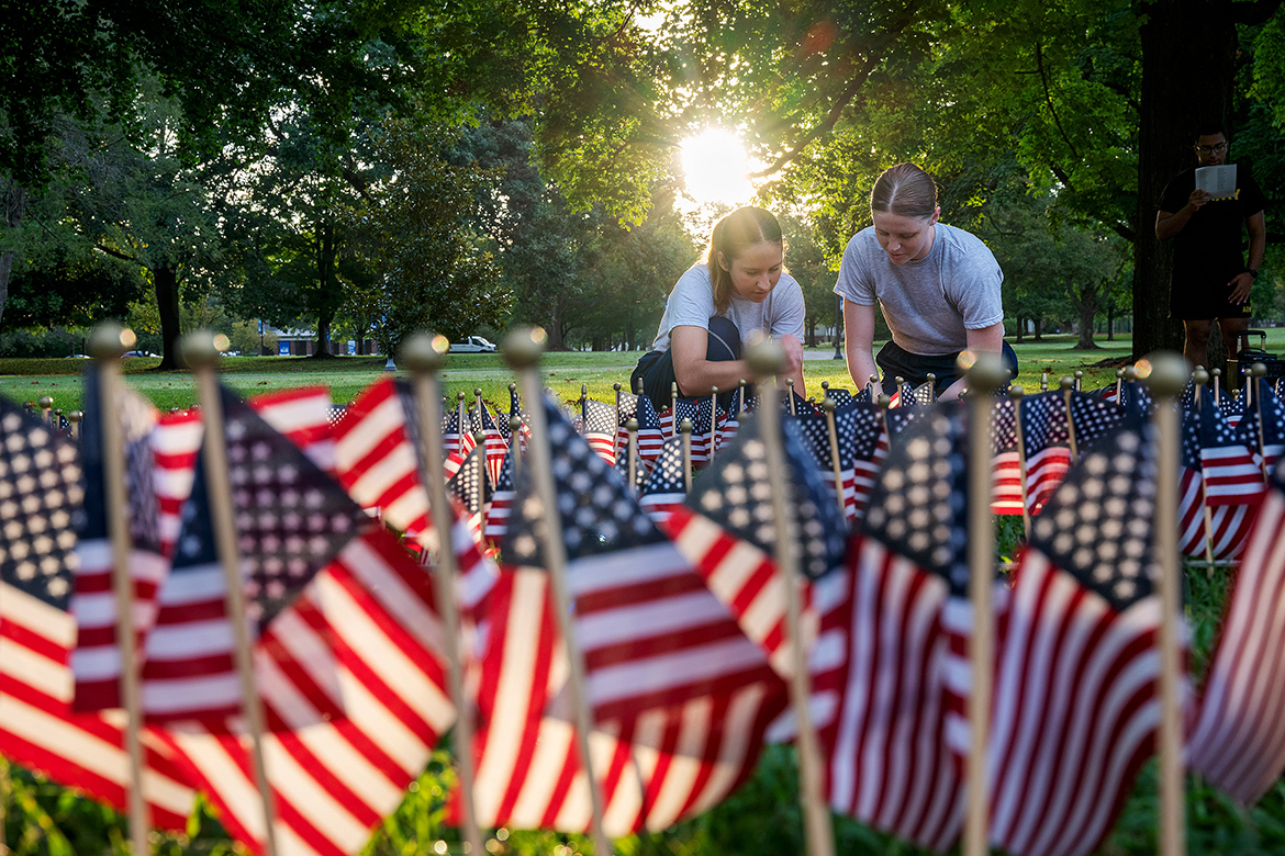 Two Middle Tennessee State University ROTC cadets join dozens of other cadets in placing U.S. flags on the lawn at the President’s House near Middle Tennessee Boulevard and East Main Street in Murfreesboro, Tenn. Friday, Sept. 6. The flags were placed there and cadets read the names of those who died on Sept. 11, 2001, in the four coordinated attacks on U.S. landmarks by the terrorist group al-Qaida. (MTSU photo by Andy Heidt)