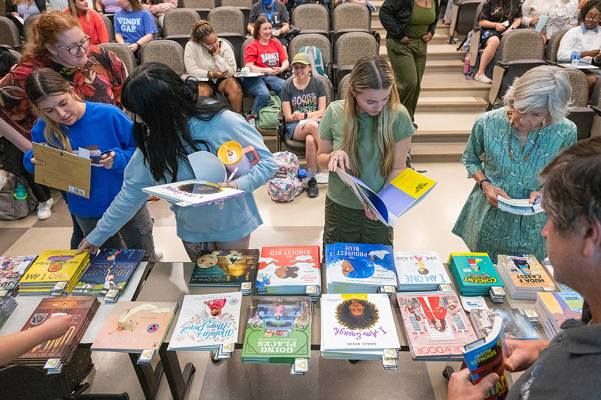 Attendees browse through the selection of free books available at the “Let Freedom READ” book banning awareness event held Wednesday, Sep. 25, at the College of Education Build-ing on the Middle Tennessee State University campus in Murfreesboro, Tenn. (MTSU photo by Cat Curtis Murphy)