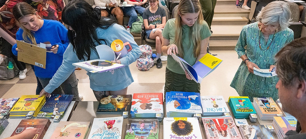 Attendees browse through the selection of free books available at the “Let Freedom READ” book banning awareness event held Wednesday, Sep. 25, at the College of Education Build-ing on the Middle Tennessee State University campus in Murfreesboro, Tenn. (MTSU pho-to by Cat Curtis Murphy)