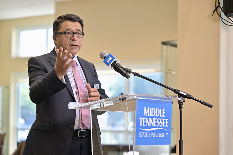 Murat Arik, director of the Business and Economic Research Center at Middle Tennessee State University, discusses the methodology behind the center’s 2024 MTSU Alumni Impact Report that showed university alums and alumni-owned businesses generated more than $15 billion in revenue throughout the state over the course of a year. Report findings were announced Monday, Oct. 7, at the Rutherford County Chamber of Commerce in Murfreesboro, Tenn. (MTSU photo by Andy Heidt)