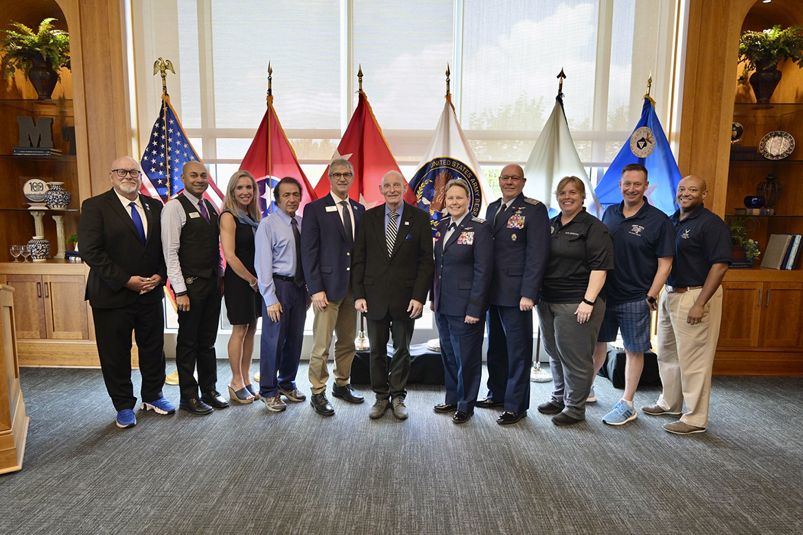 MTSU College of Basic and Applied Sciences Dean Greg Van Patten, center left, and retired Army Lt. Gen. Keith Huber, center, MTSU’s senior adviser for veterans and leadership initiatives, join MTSU faculty and administrators in welcoming Maj. Gen. Regena Aye, center right, Civil Air Patrol’s national commander, and Col. Jeff Garrett, right of Aye, commander of CAP’s Southeast Region. (MTSU photo by Andy Heidt)