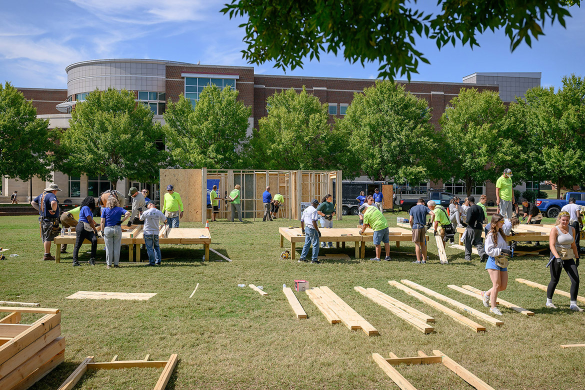 Middle Tennessee State University students, faculty and staff and Exit Realty volunteers build parts of a house for the annual Habitat for Humanity panel build on Thursday, Oct. 3, at the Student Union Commons in Murfreesboro, Tenn. (MTSU photo by J. Intintoli)