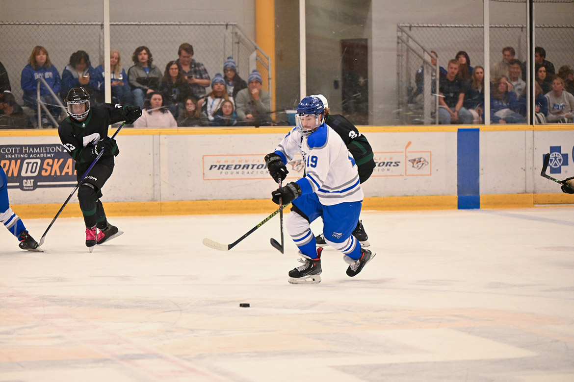 Middle Tennessee State University’s Harvey Rench, a senior from Hendersonville, Tenn., and center for MTSU’s ice hockey team, controls the puck at the first home game of the season on Sept. 27 against the University of Alabama-Birmingham at the Ford Ice Center in Antioch, Tenn. (MTSU photo by James Cessna)